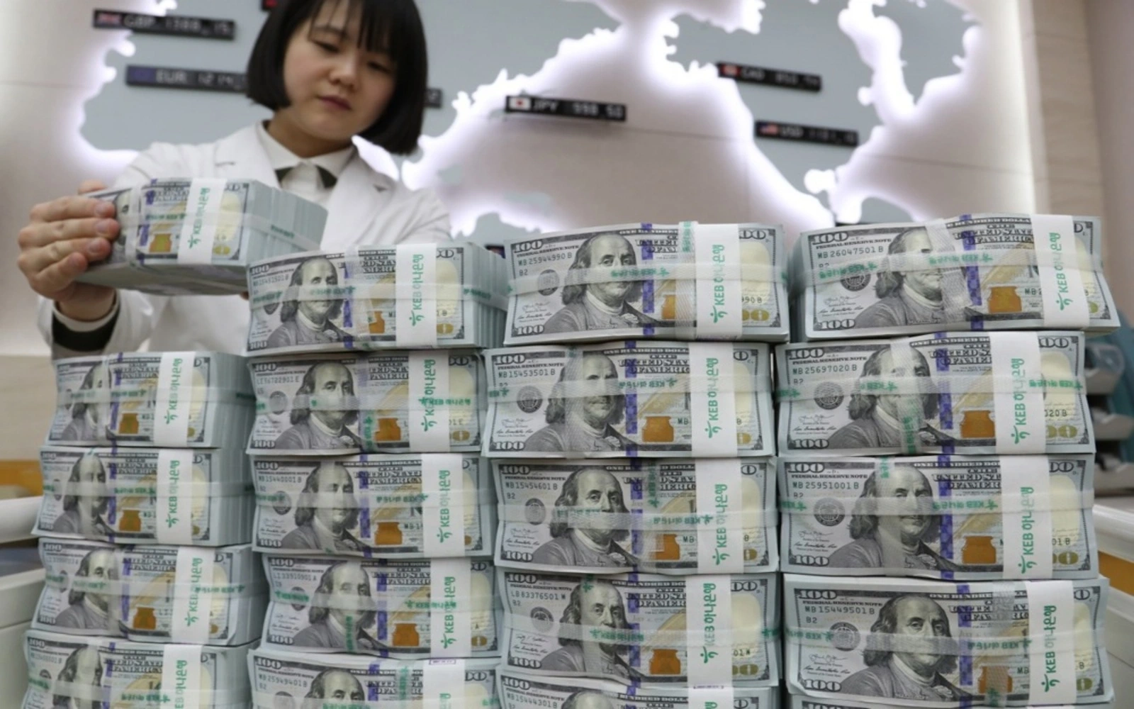 FX hedging cost drop sparks debate on Asia bond defence bets