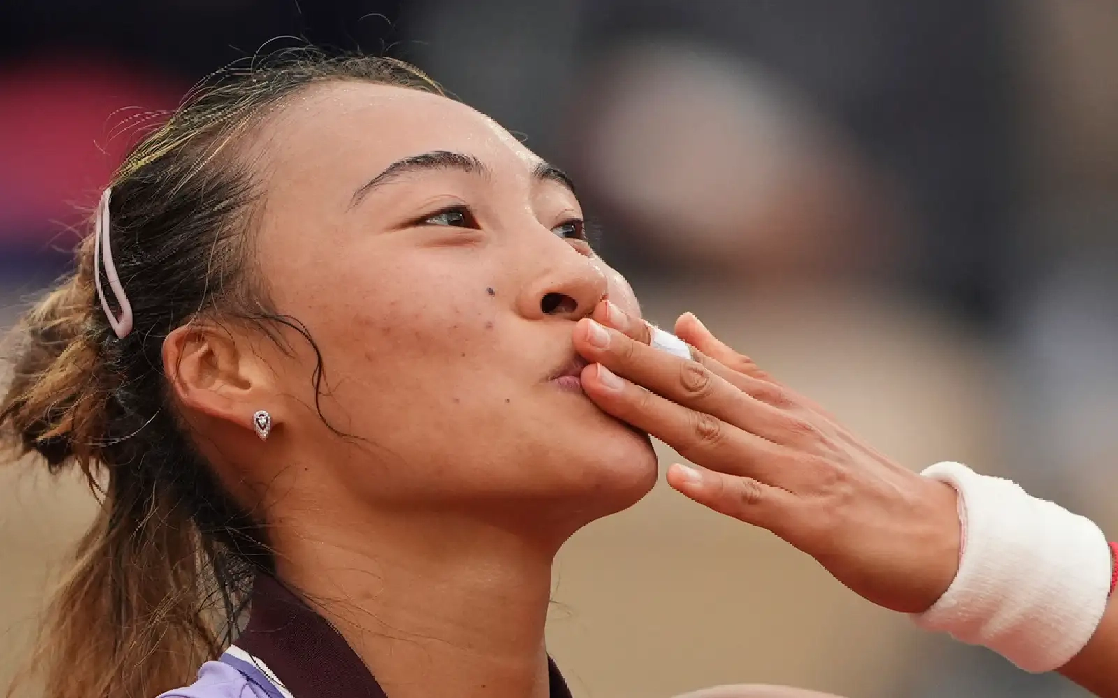 Zheng, Paolini through to French Open last 16