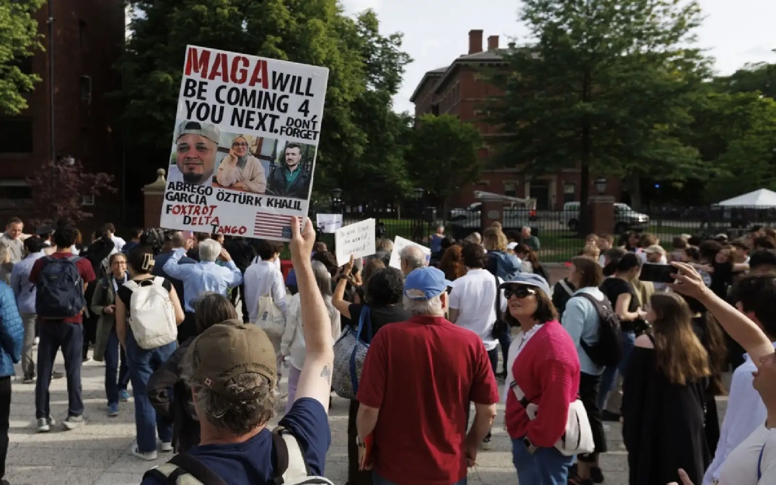 Harvard students march after Trump seeks to cut remaining contracts