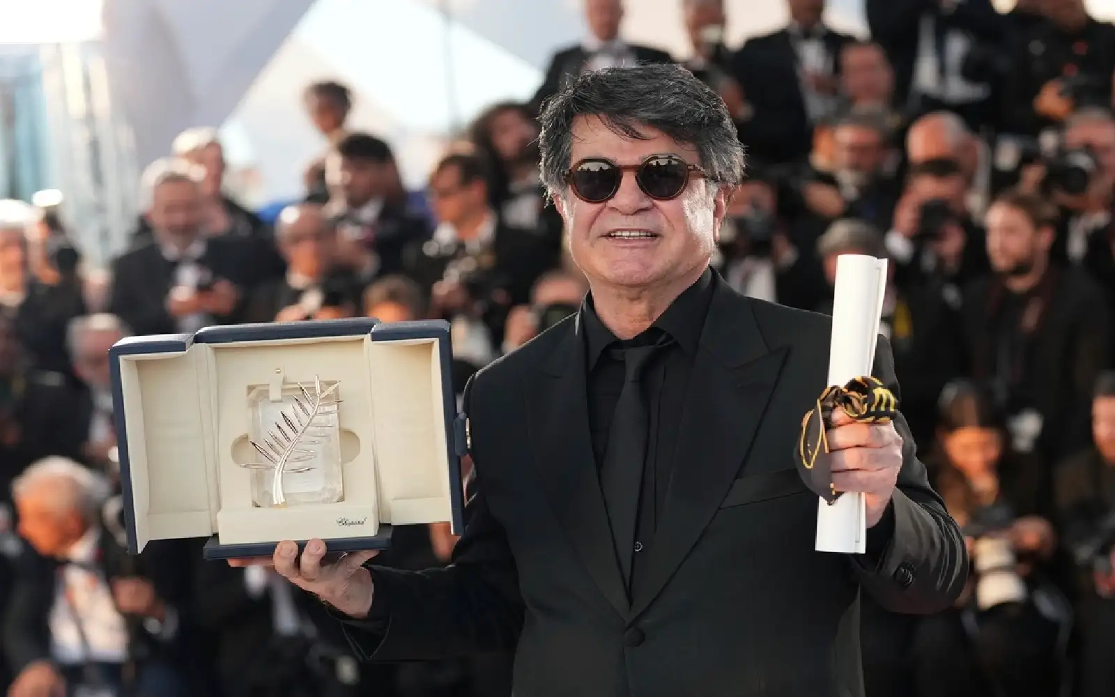 Iran silent as dissident director wins Cannes' top prize