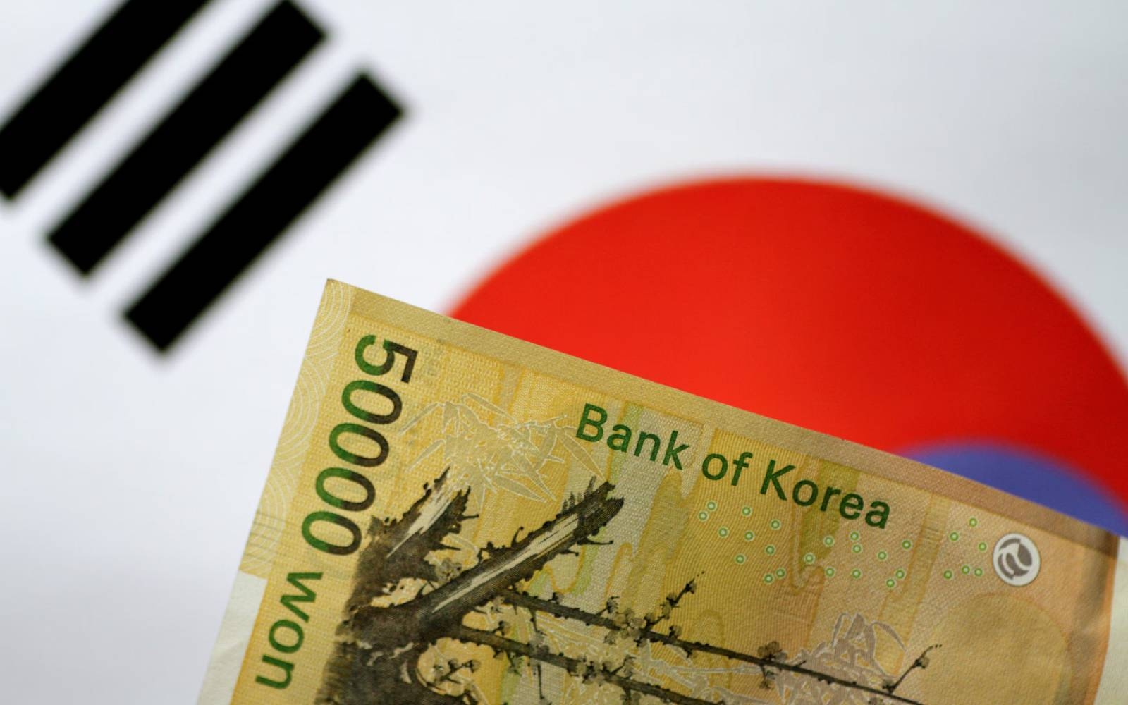 S. Korea's central bank cuts rate, slashes 2025 growth forecast
