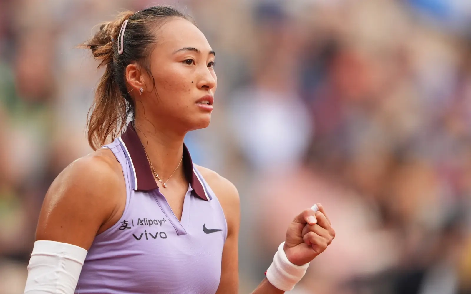 Olympic champion Zheng powers into French Open third round