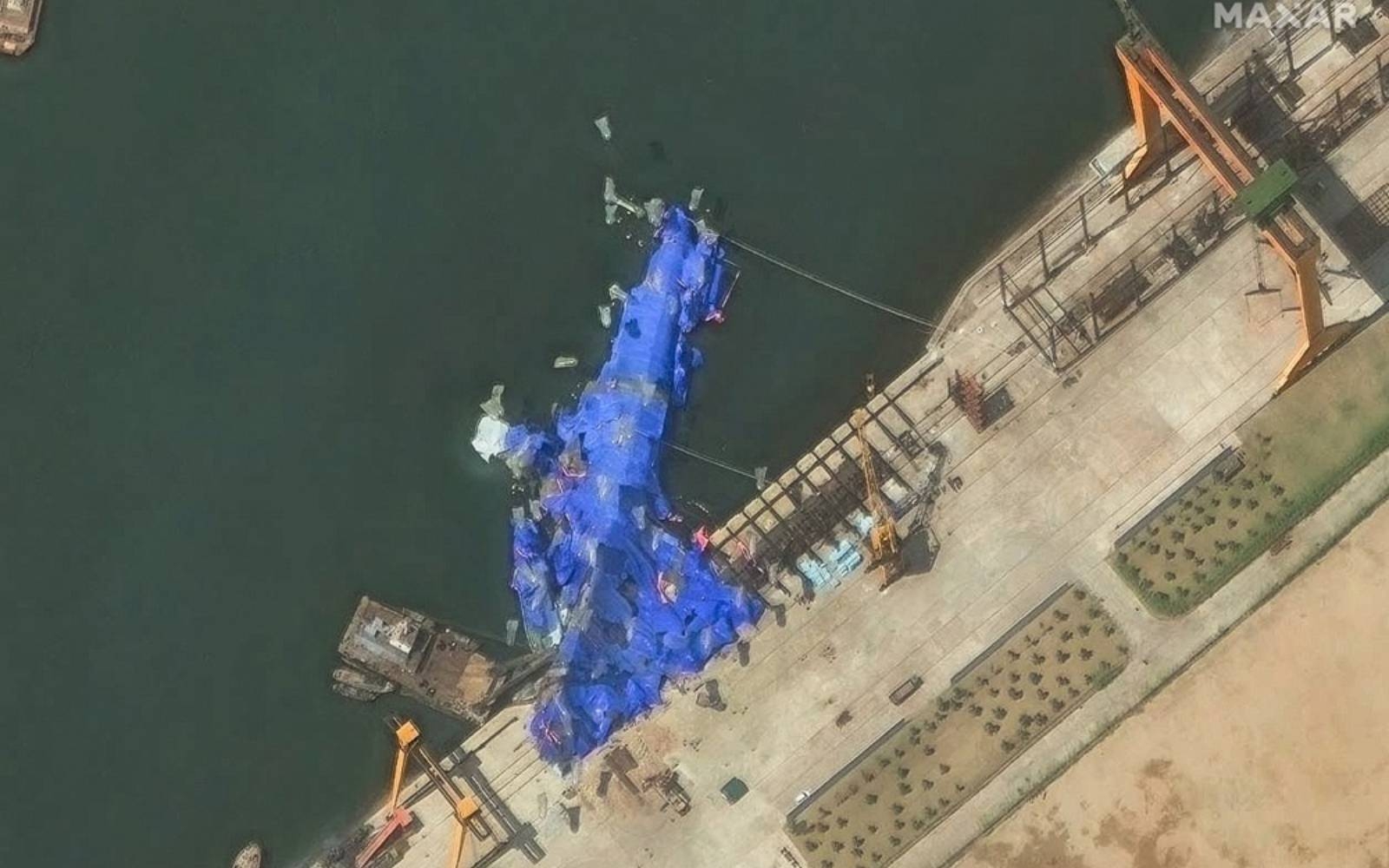 N. Korea detains three over warship launch accident