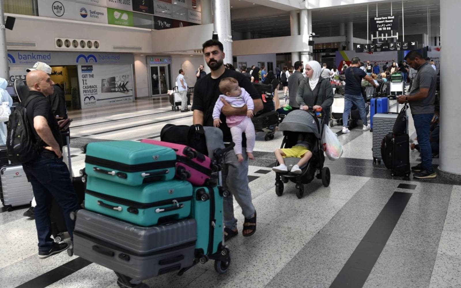 Airlines halt many Middle East flights after Israel hits Iran