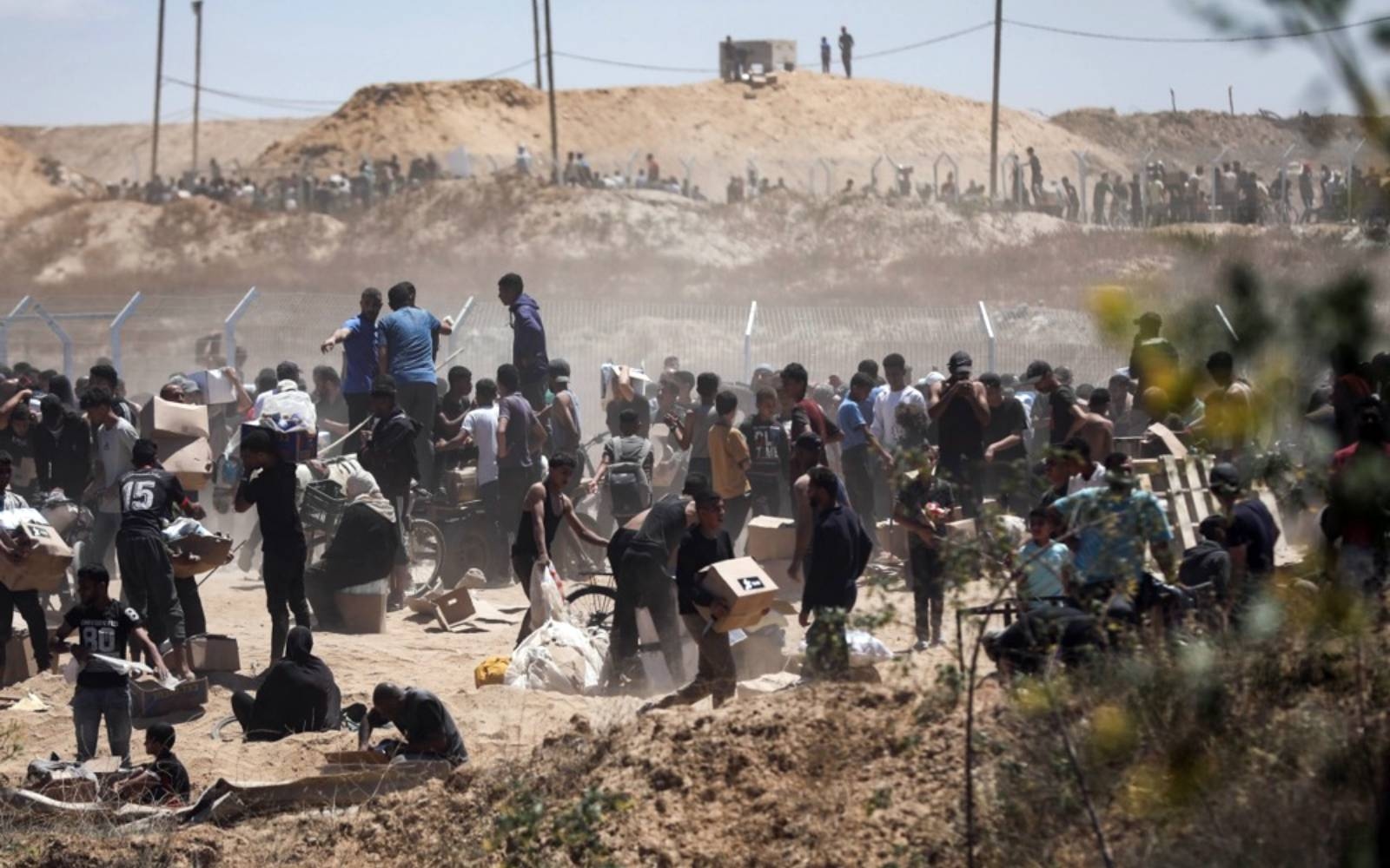 Israeli tank shelling kills 51 people awaiting aid trucks in Gaza