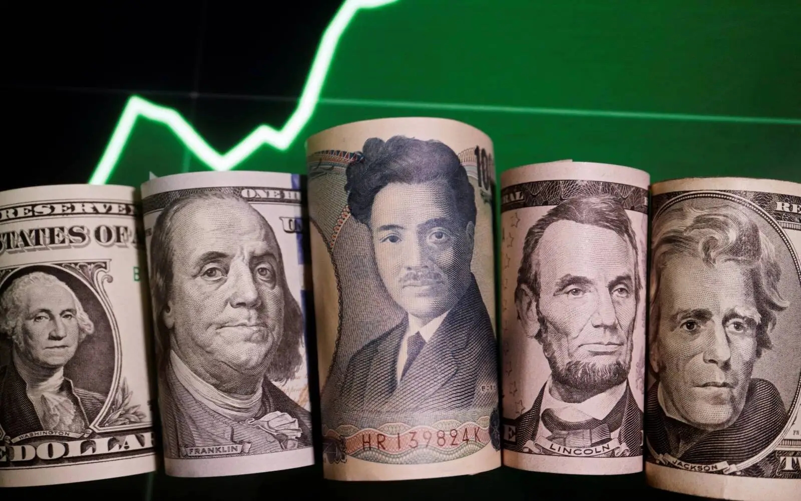 Yen upbeat as BOJ turns less gloomy, dollar set for monthly gain