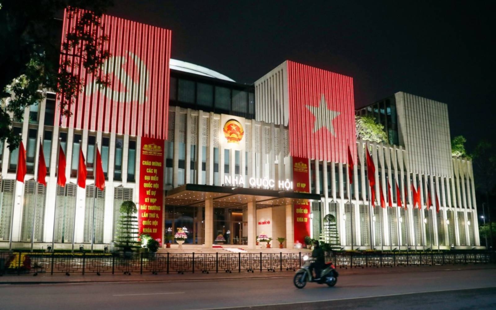 Vietnam's lawmakers approve merging provinces, slashing nearly 80,000 jobs