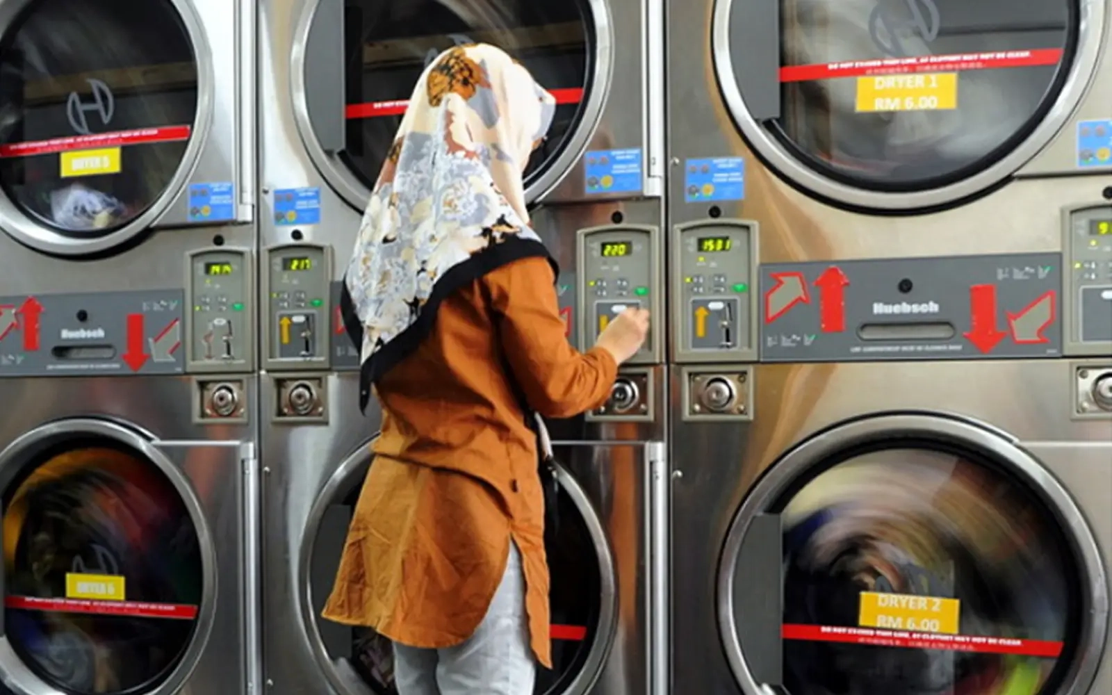 Let laundromats use subsidised gas tanks too, group urges govt
