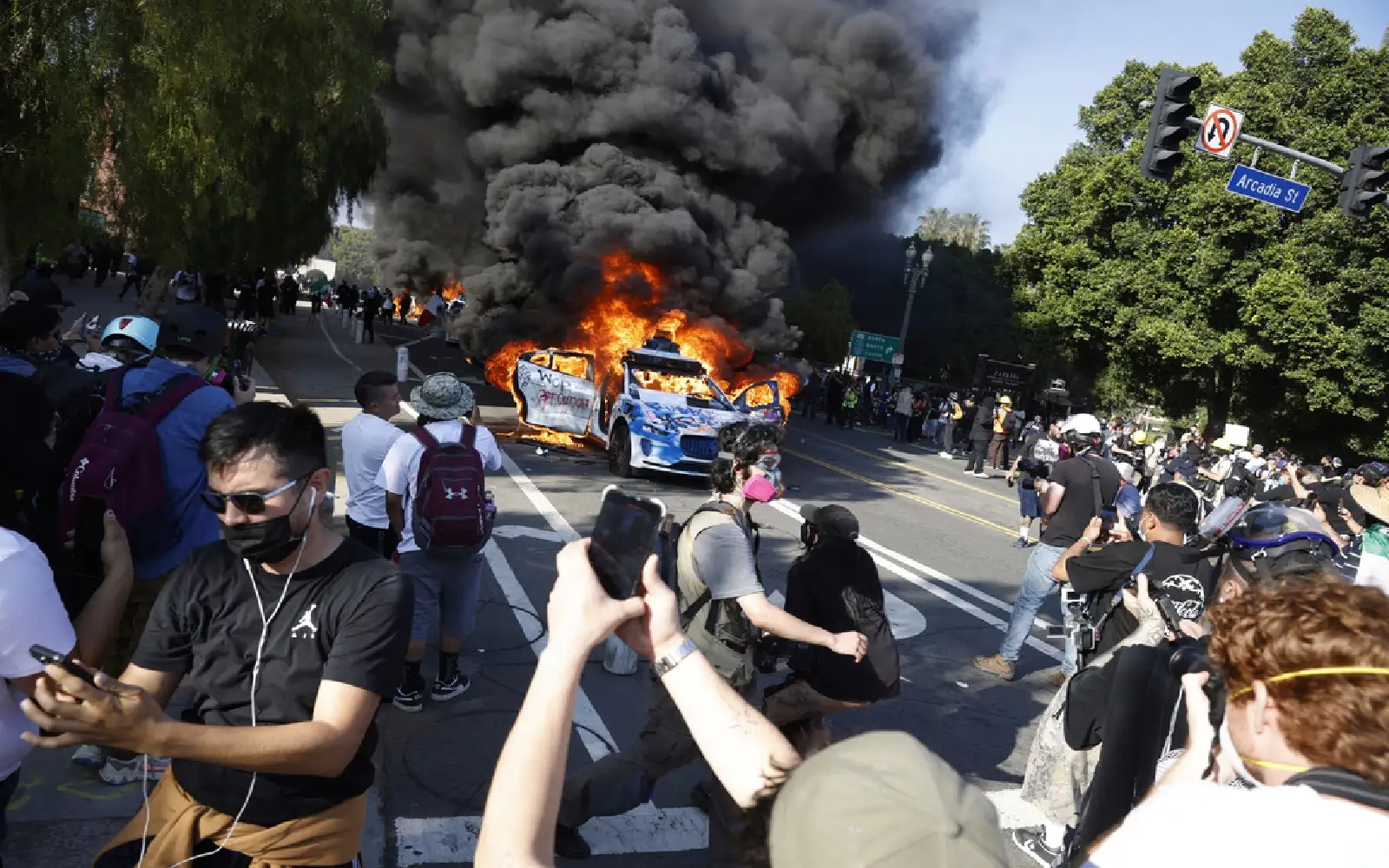 Unrest in Los Angeles as troops sent by Trump fan out