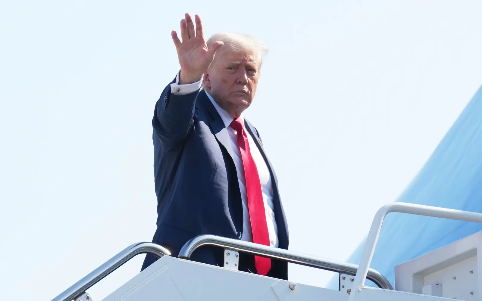 Trump orders firing of US official as cracks emerge in jobs market