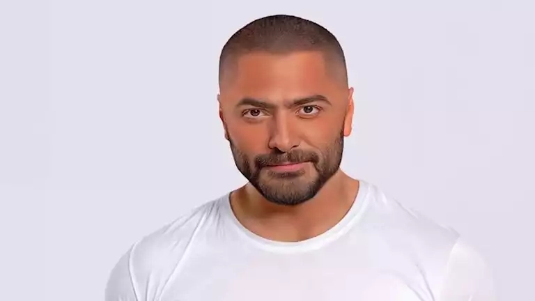 بالصور- تامر حسني وبسمة بوسيل يحتفلان بعيد ميلاد ابنتيهما تاليا وأمايا