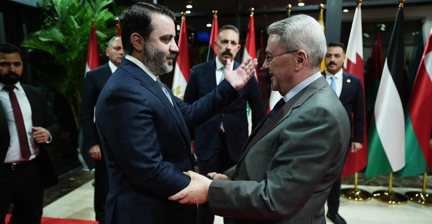 Al-Shibani in Baghdad representing Syria's Al-Sharaa