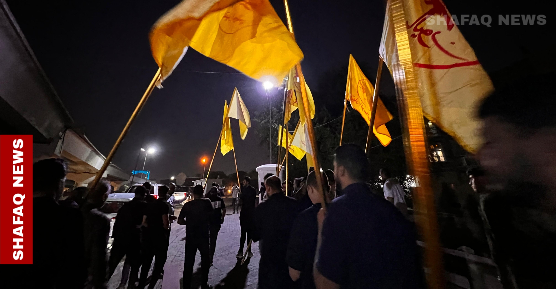 Supporters of Iraqi armed factions protest against Israeli strikes on Iran