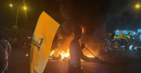 Hezbollah supporters rally against Lebanon disarmament plan