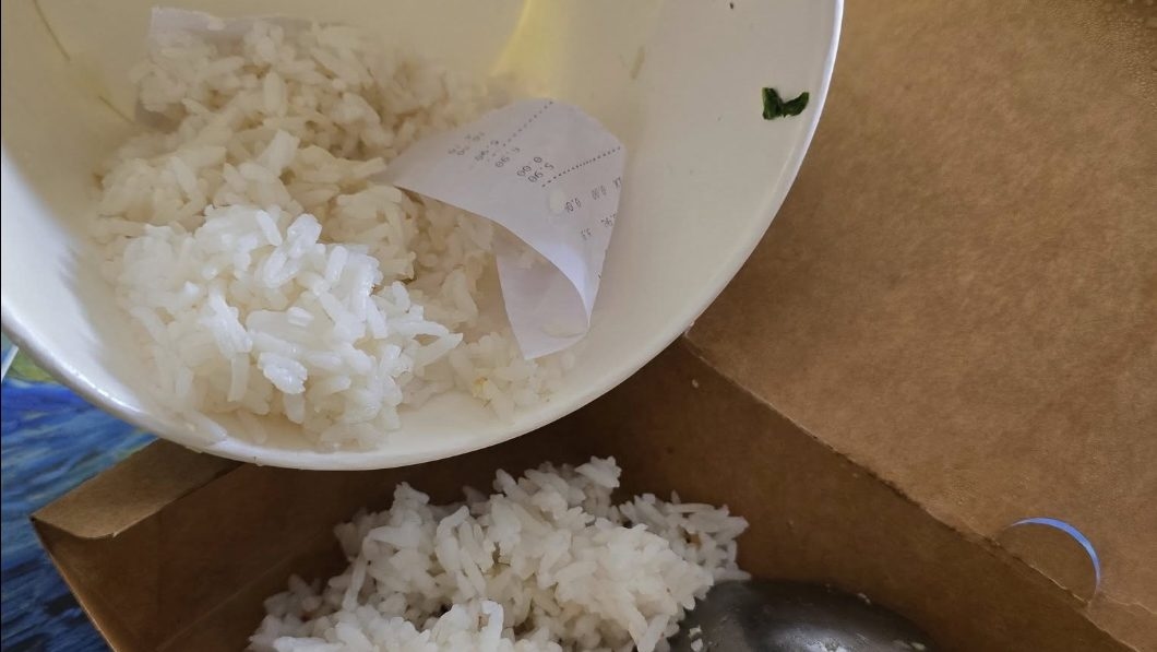 Woman says she found receipt under rice and vegetables in her food order