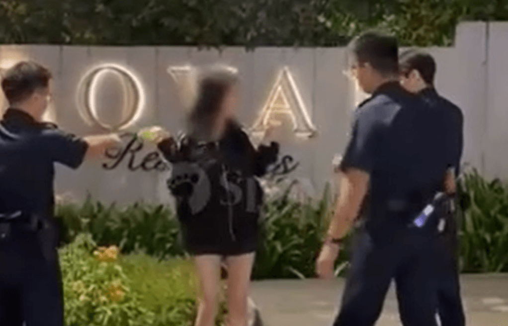 21-year-old woman arrested after trying to step into traffic at Simon Road