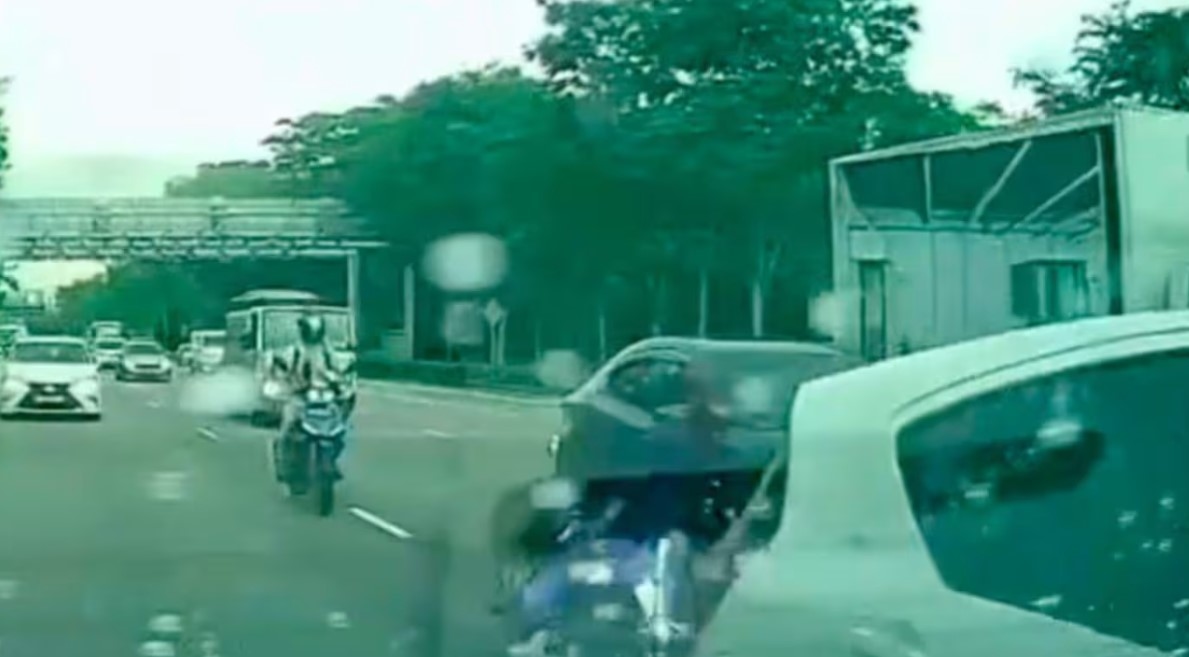 Female motorcyclist injured after car suddenly changes lanes on AYE to avoid stationary car in front