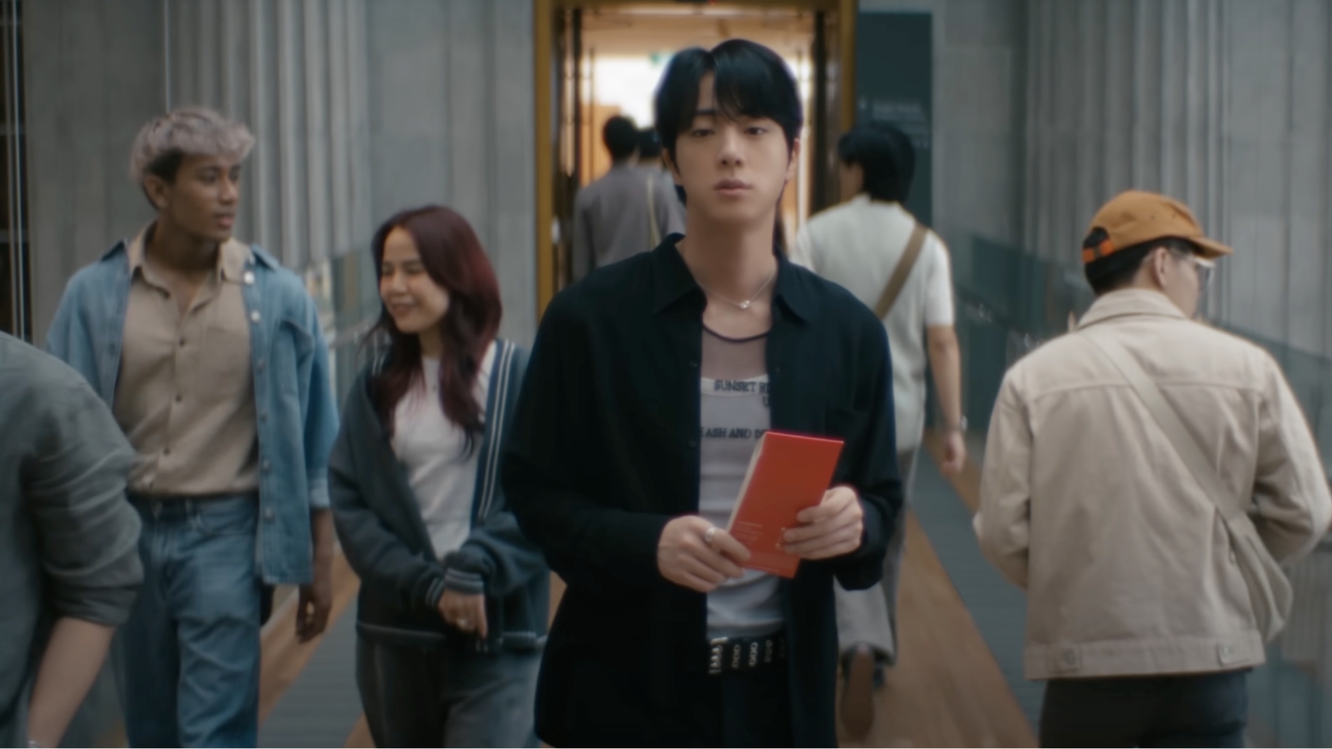 BTS member Jin filmed his newest music video at Singapore's National Gallery
