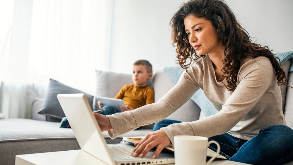 How Much Would A Mom Make A Year If Paid For Home Responsibilities? Here's The Six-Figure Answer