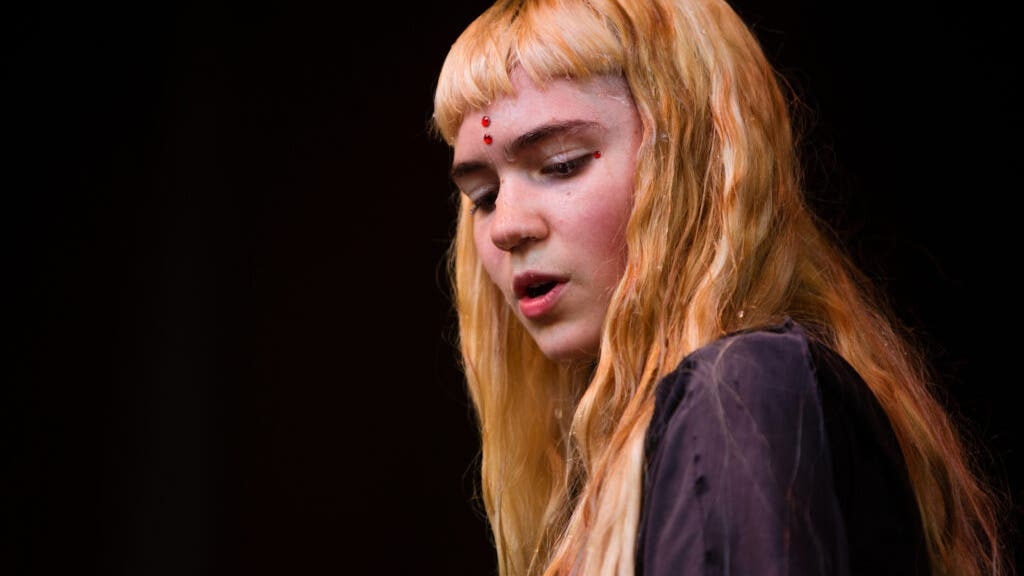 Elon Musk's Ex-Girlfriend Grimes Questions Mark Zuckerberg's Aptitude For Metaverse Leadership, Says Zuckerberg Is 'Wildly Under Qualified'