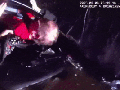WATCH: Quick-thinking deputy smashes window to save driver from drowning in flooded river