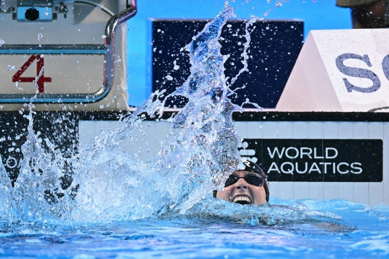 Ledecky reigns over McIntosh as record-breaking US hit back at critics