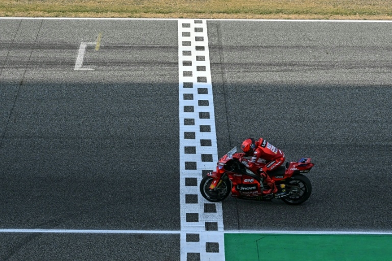 Marc Marquez wins season-opening Thai MotoGP after duel with brother Alex