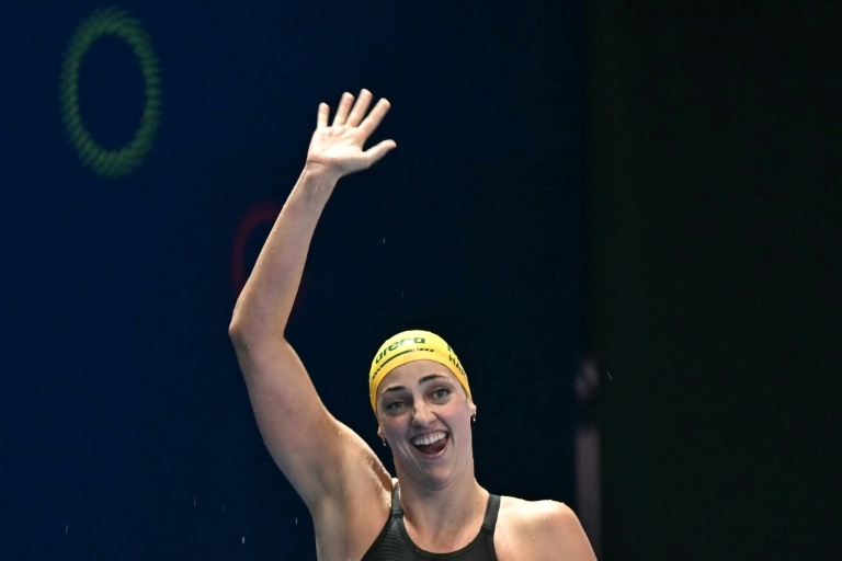 Australia's beaming Harris foils Walsh treble bid at swimming worlds
