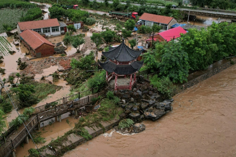 Four killed as heavy rain, flooding soaks northern China