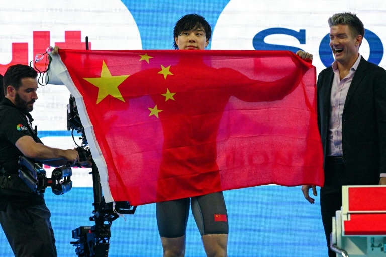 Qin beats Olympic champ Martinenghi for 100m breaststroke world gold