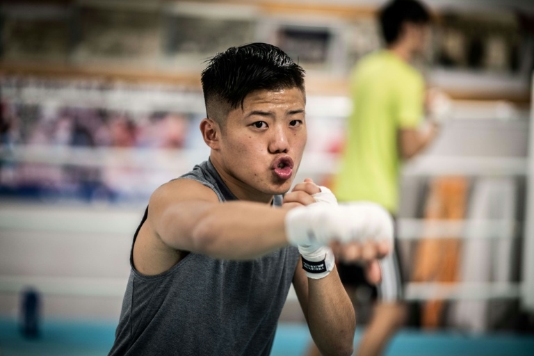 Top Japanese fighter retires to support comatose boxer brother
