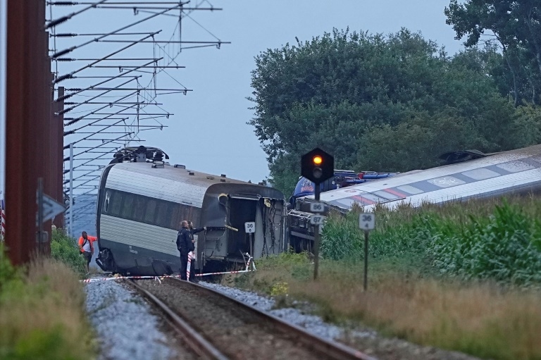 Danish train moving at 'relatively high speed' when hit farm truck: police