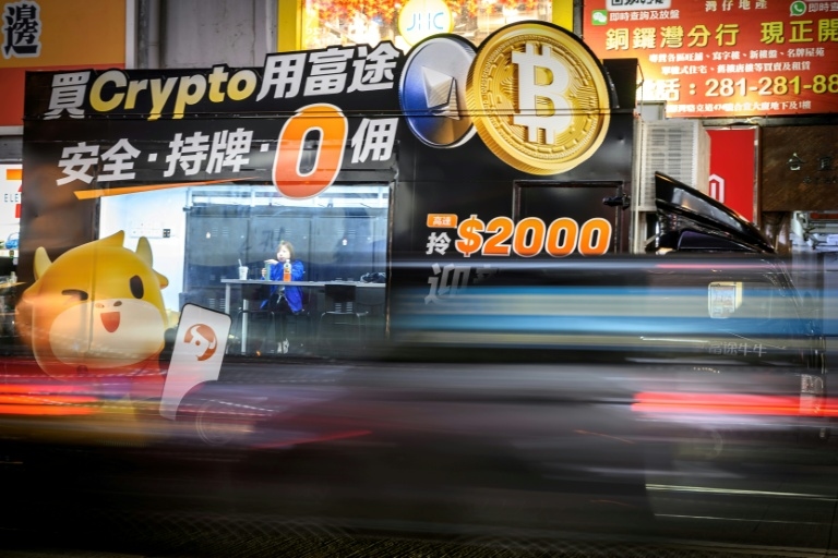 Asian markets mixed as bitcoin surges to new high
