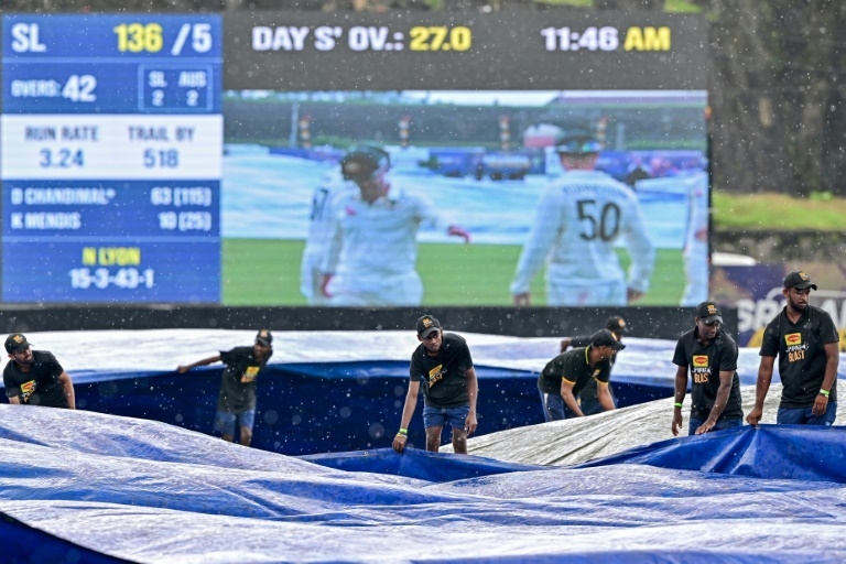 Downpour halts Sri Lanka Test as Australia tighten grip