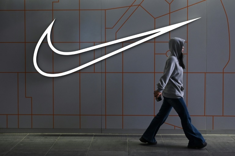 Nike profits sink but company says it is turning a corner