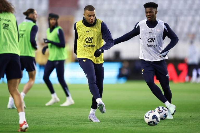 Mbappe 'happy' to be back with France national team