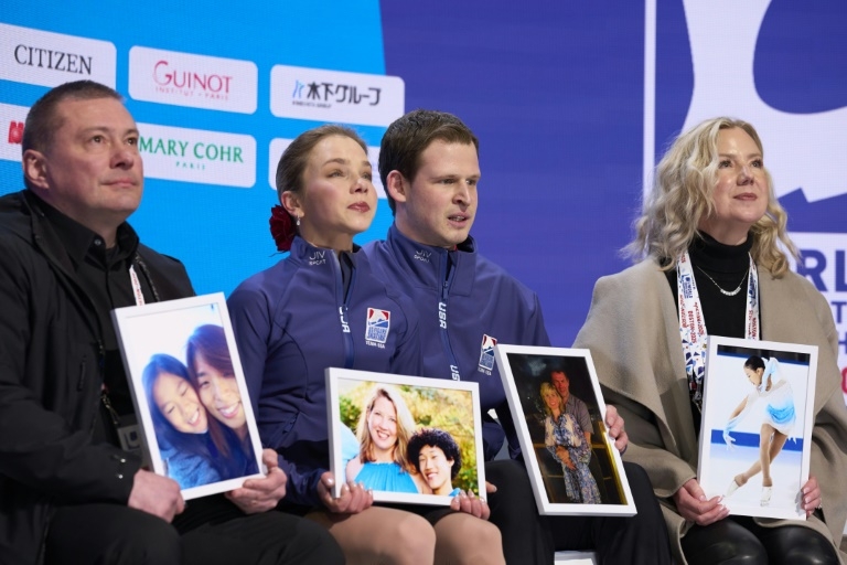 Figure skating mourns plane crash victims at somber World Championships