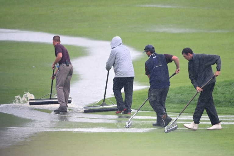 Heavy rain halts final round of US Open at soaked Oakmont
