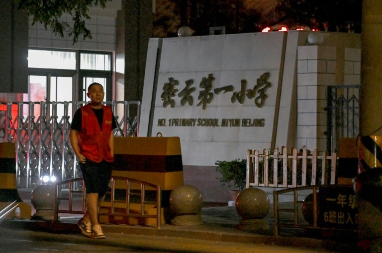 Vehicle hits pedestrians near primary school in Beijing