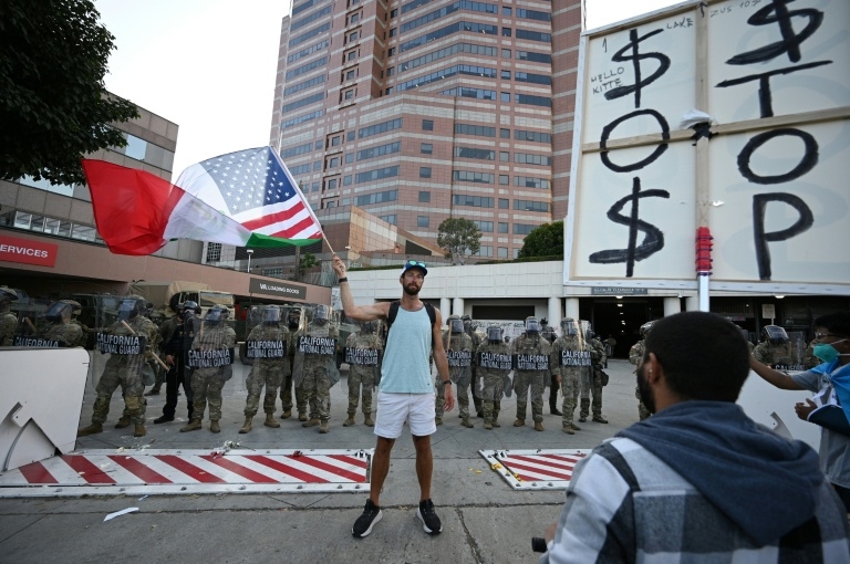 Judge orders Trump to return control of National Guard to California