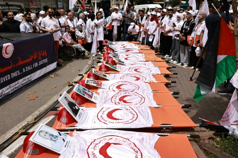 Hundreds march in West Bank against killings of Palestinian medics