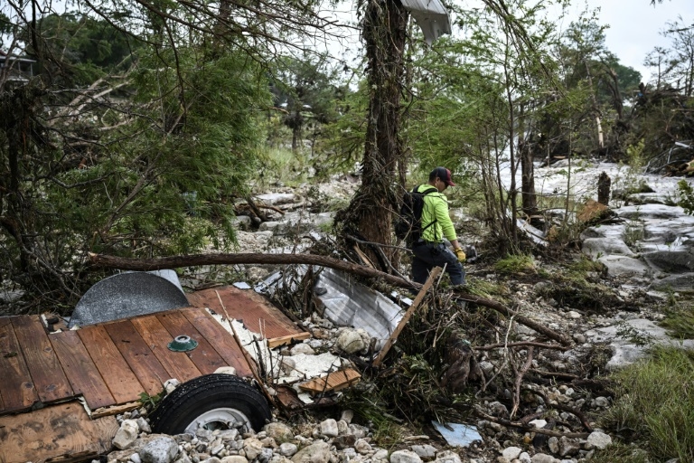 Search for woman who texted 'we're being washed away' in Texas flood