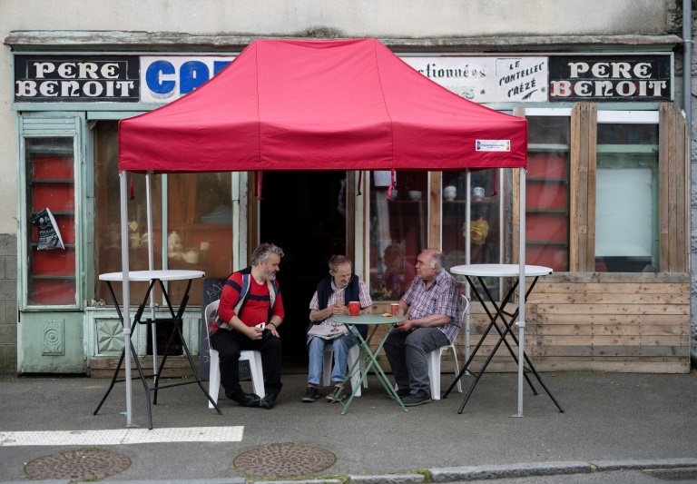 French parliament adopts bill to bring back village bars
