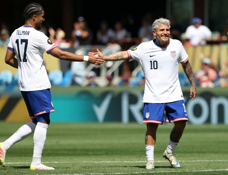 USA end losing streak with crushing of hapless Trinidad
