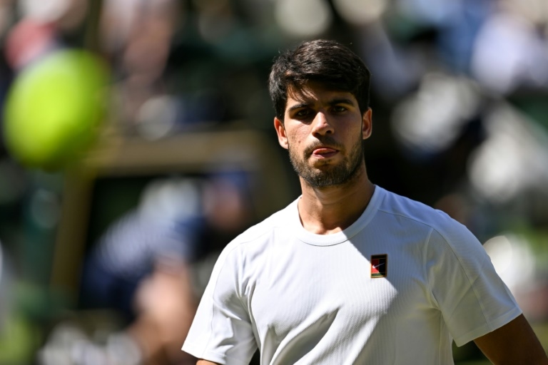 Smiling through: Alcaraz won't let Wimbledon defeat get him down