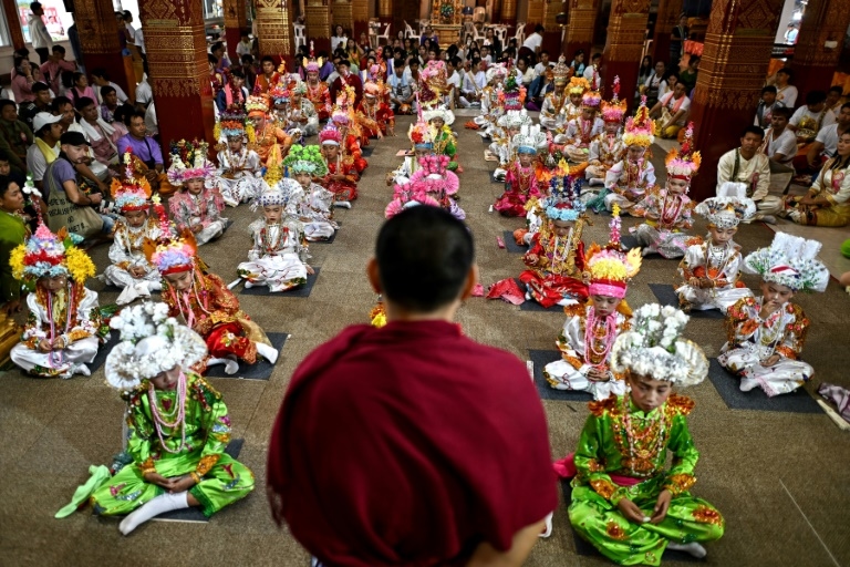 Flowers in their hair: Shan boys ordained into Buddhist monkhood