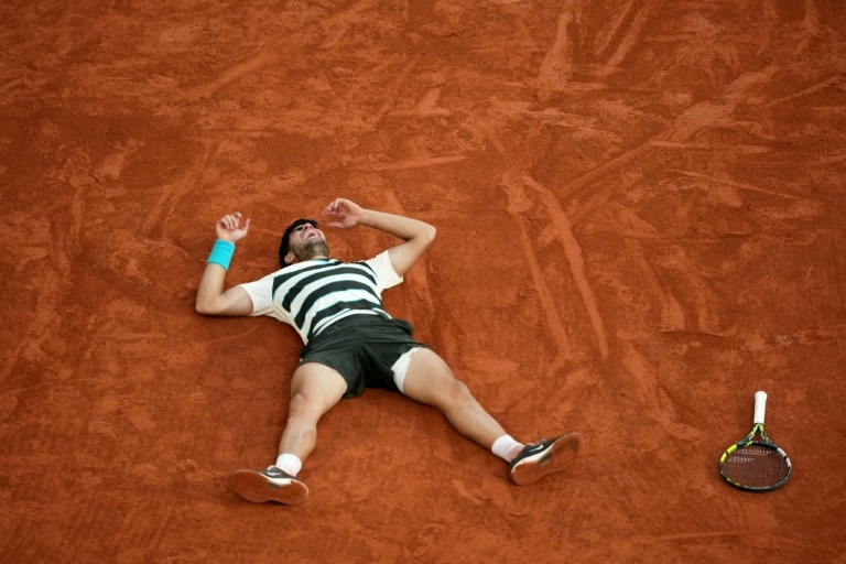 Alcaraz saves three match points to beat Sinner to French Open title