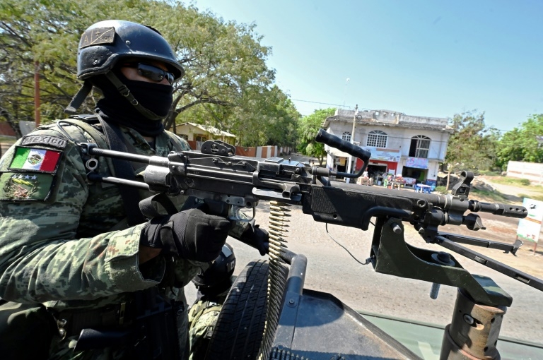 Mexico says 10 Colombian ex-soldiers arrested after deadly blast