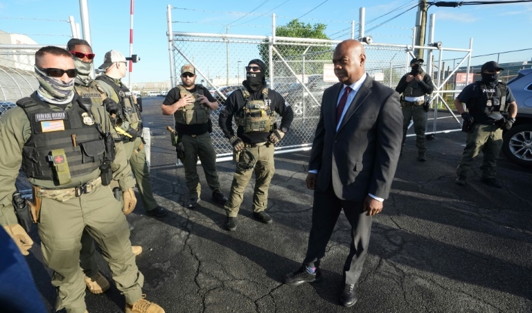 Mega detention center for US migrants sees violence, escapes