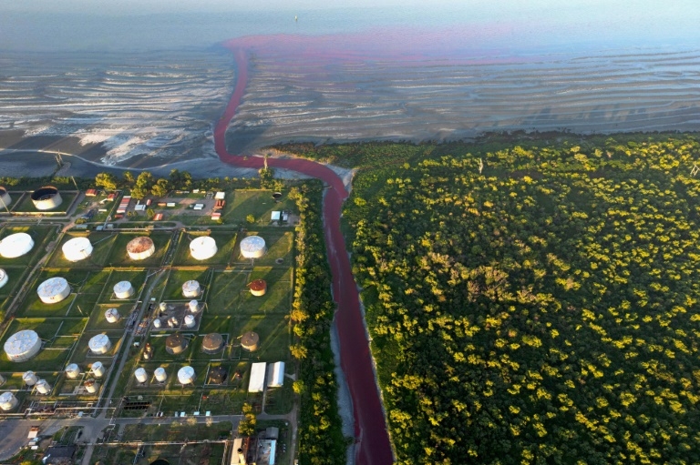 A stream turns blood red in Argentina, residents blame pollution
